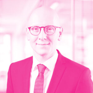 Arne Thiermann's headshot with a hot pink filter.