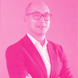 Arnold Liwanag's headshot with a hot pink filter.