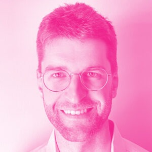 Charles Lespérance's headshot with a hot pink filter.