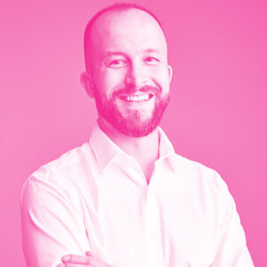 Christiaan Jordaan's headshot with a hot pink filter.