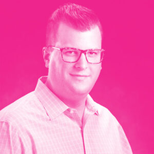 Colin Ake's headshot with a hot pink filter.
