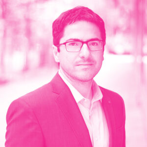 Daniel De Carvalho's headshot with a hot pink filter.