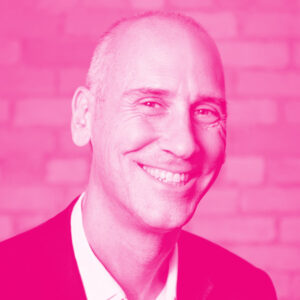 Gregory Ogorek's headshot with a hot pink filter.