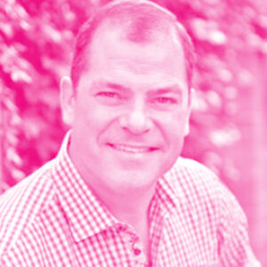 James Swayze's headshot with a hot pink filter.