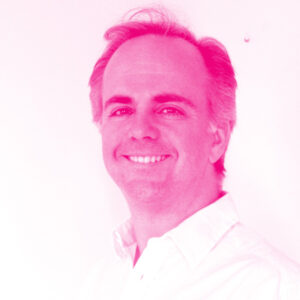 Jamie Lesser's headshot with a hot pink filter.