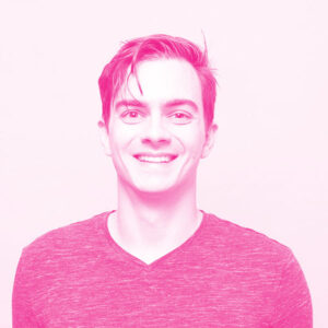 Joseph Viviano's headshot with a hot pink filter.