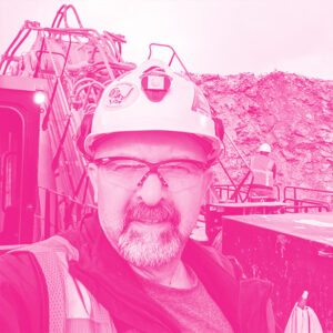 Laeeque Daneshmend's headshot with a hot pink filter.