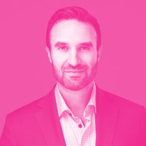 Meir Rabkin's headshot with a hot pink filter.