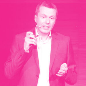 Pierre-Philippe Mathieu's headshot with a hot pink filter.