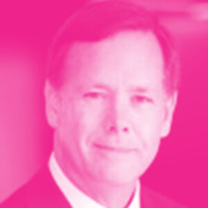 Tom Tefft's headshot with a hot pink filter.