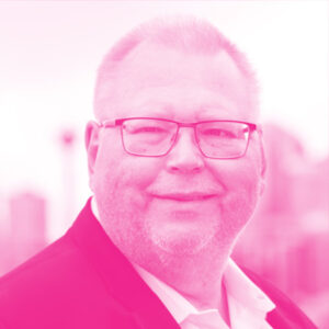 Yrjö Koskinen's headshot with a hot pink filter.