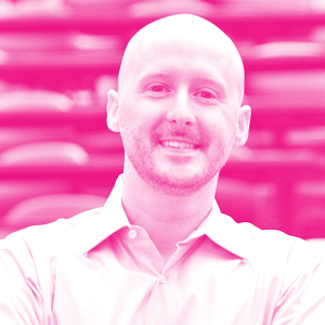 Alberto Galasso's headshot with a hot pink filter.