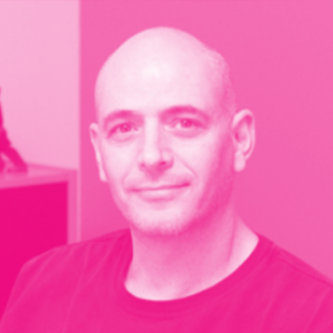 Lahav Gil's headshot with a hot pink filter.