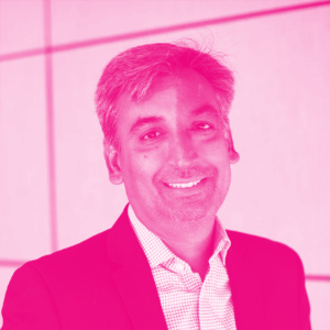 Naveen Agarwal's headshot with a hot pink filter.